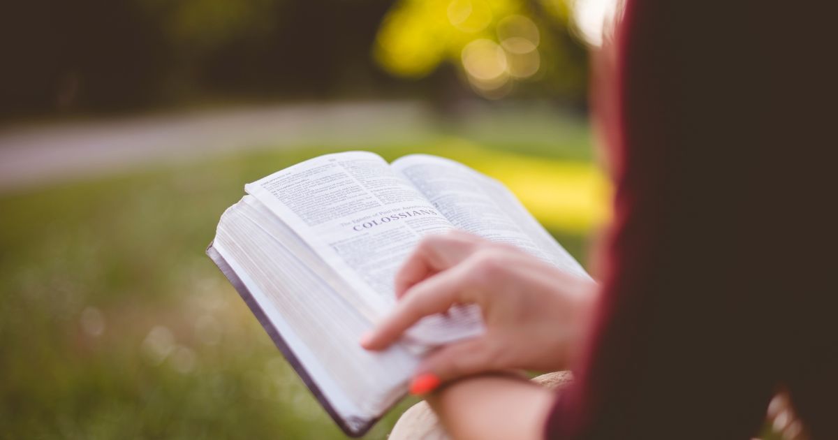 woman reading a bible